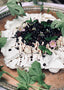 Pavlova med mørke bær og balsamico